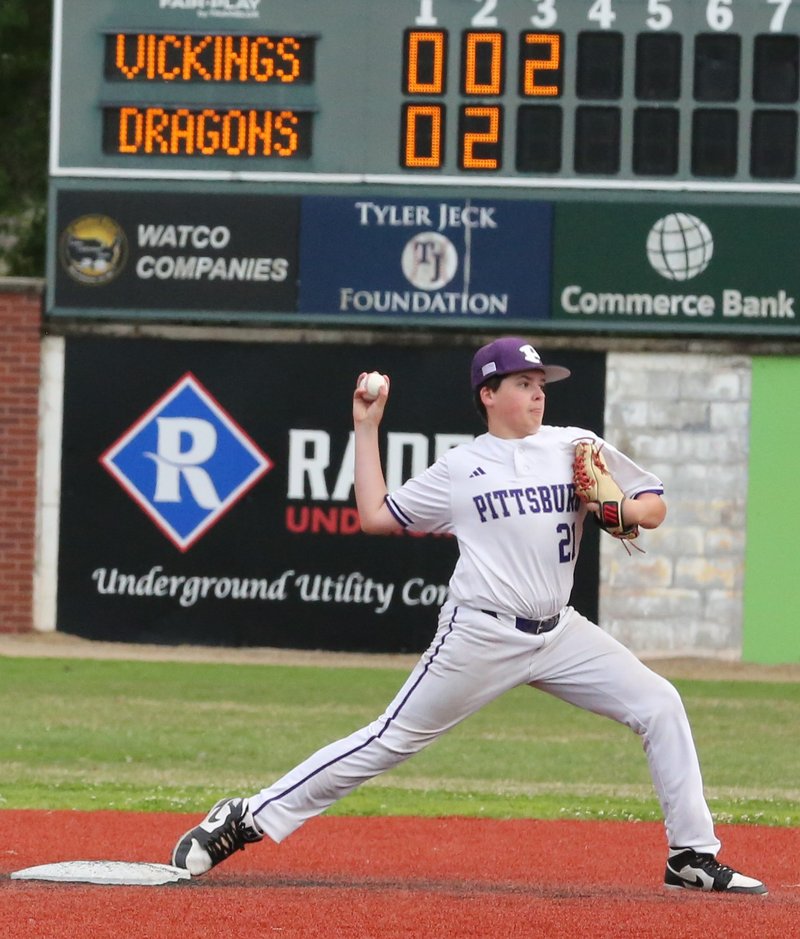 Pittsburg second baseman Brayden Wilson turns a 6-4-3 double play Thursday against Parsons at historic Jaycee Ballpark. BROCK SISNEY / THE MORNING SUN