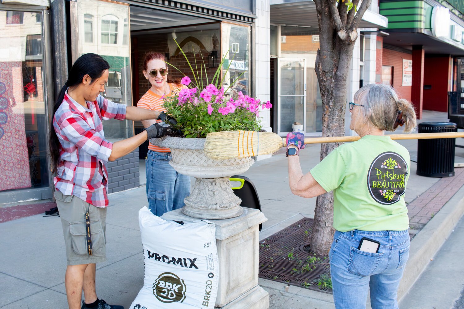 20240515-194041-aee-240516-Green thumbs at work planting 2.jpg