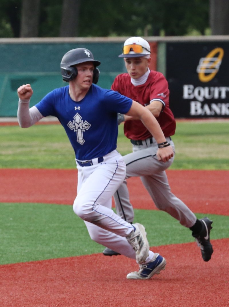 Joplin second baseman Hayden Wolf tags out Colgan's Lane Stultz during a rundown in the seventh inning Friday at Jaycee Ballpark. BROCK SISNEY / THE MORNING SUN