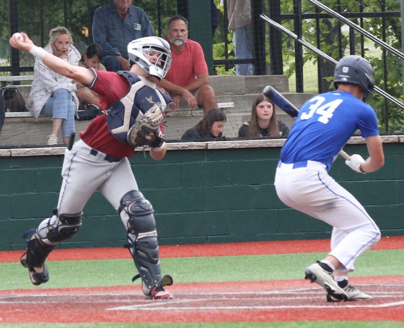 Joplin catcher Daniel Rose makes the perfect throw Friday night against St. Mary's Colgan at Jaycee Ballpark. BROCK SISNEY / THE MORNING SUN