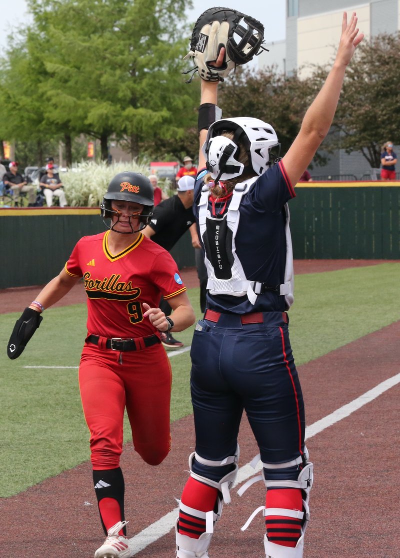 Heather Arnett scores a run for Pitt State softball