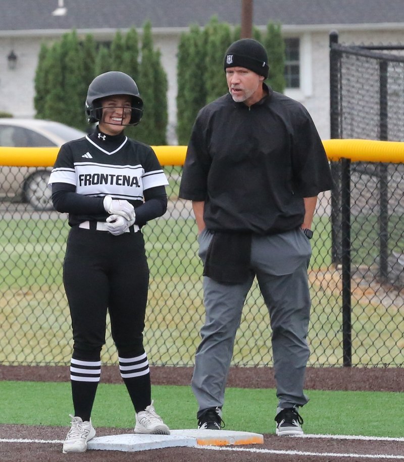 Softball player and coach talk